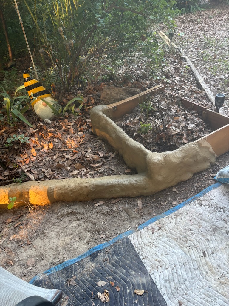 Cob-edged garden bed built by Love-Leigh Hughes